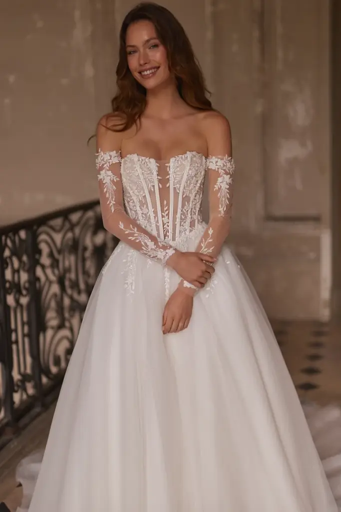Brautkleid mit schulterfreien Spitzenärmeln und weitem glattem Rock